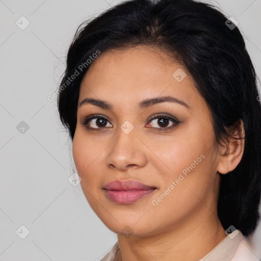 Joyful latino young-adult female with medium  black hair and brown eyes