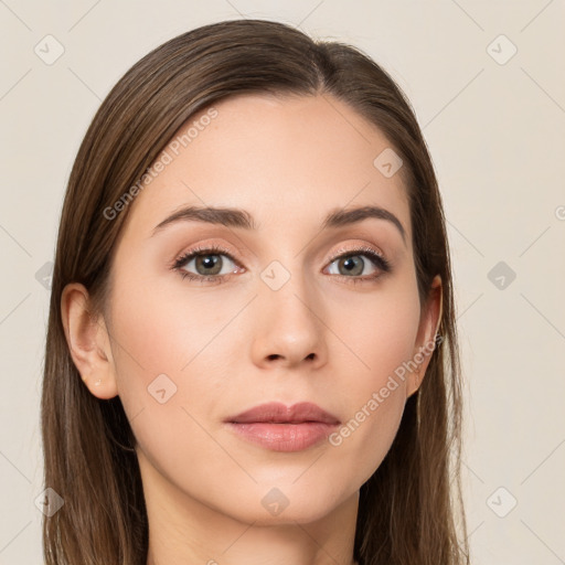 Neutral white young-adult female with long  brown hair and brown eyes