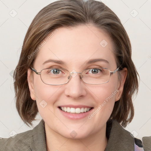 Joyful white adult female with medium  brown hair and blue eyes