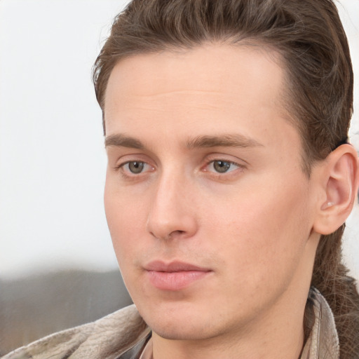 Neutral white young-adult male with long  brown hair and grey eyes