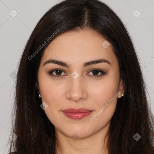 Joyful latino young-adult female with long  brown hair and brown eyes