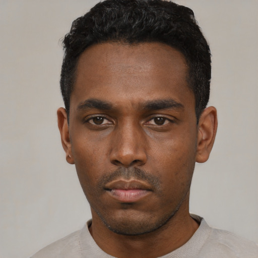 Neutral black young-adult male with short  black hair and brown eyes