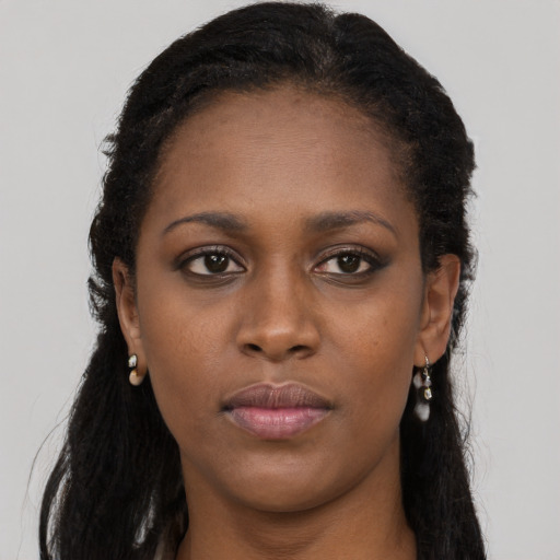 Neutral black young-adult female with long  black hair and brown eyes