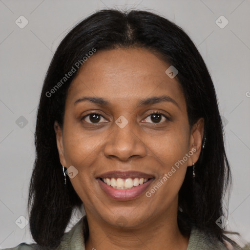 Joyful black young-adult female with medium  brown hair and brown eyes