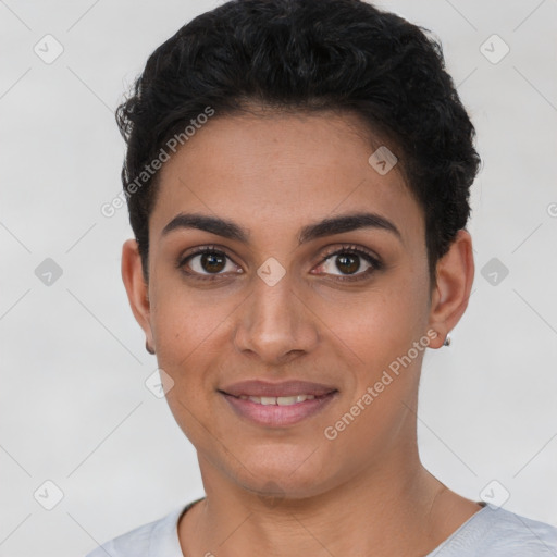 Joyful latino young-adult female with short  brown hair and brown eyes