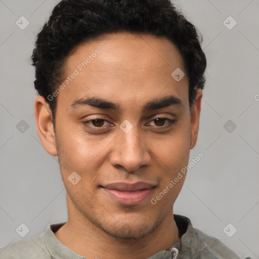 Joyful latino young-adult male with short  brown hair and brown eyes