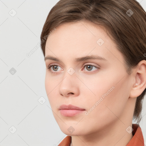 Neutral white young-adult female with short  brown hair and grey eyes