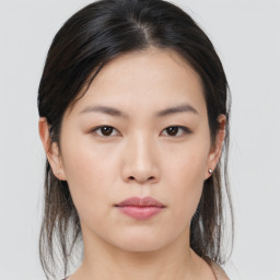 Neutral asian young-adult female with medium  brown hair and brown eyes