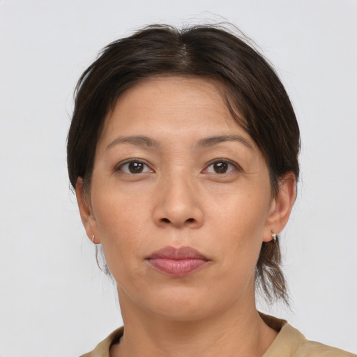 Neutral white adult female with short  brown hair and brown eyes
