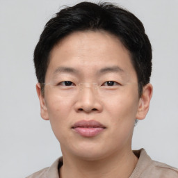 Neutral asian young-adult male with short  brown hair and brown eyes