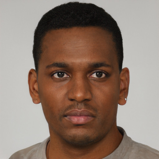 Neutral black young-adult male with short  black hair and brown eyes