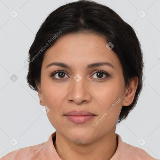 Joyful latino young-adult female with medium  brown hair and brown eyes