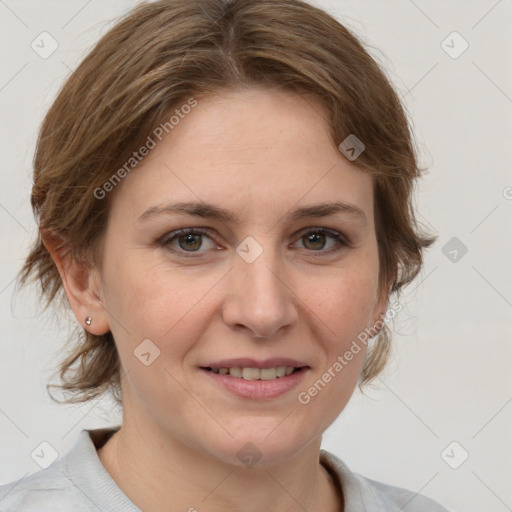 Joyful white adult female with medium  brown hair and brown eyes