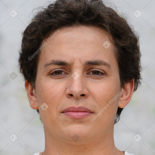 Joyful white adult female with short  brown hair and brown eyes