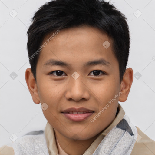 Joyful asian young-adult male with short  brown hair and brown eyes