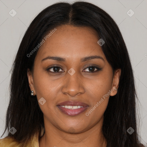 Joyful black young-adult female with long  brown hair and brown eyes