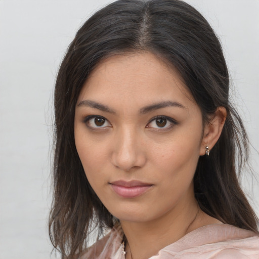 Neutral asian young-adult female with medium  brown hair and brown eyes