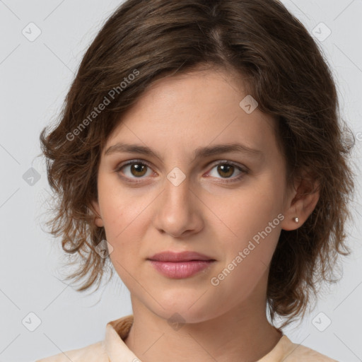 Joyful white young-adult female with medium  brown hair and green eyes