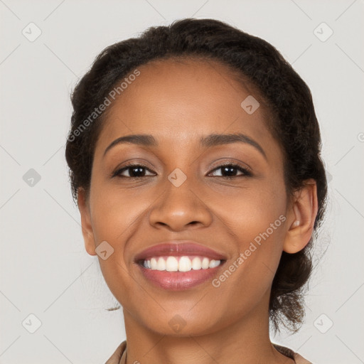 Joyful latino young-adult female with long  brown hair and brown eyes