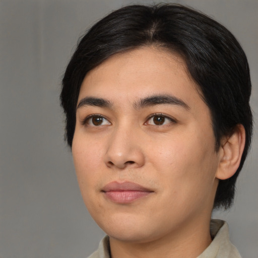 Joyful asian young-adult female with medium  brown hair and brown eyes
