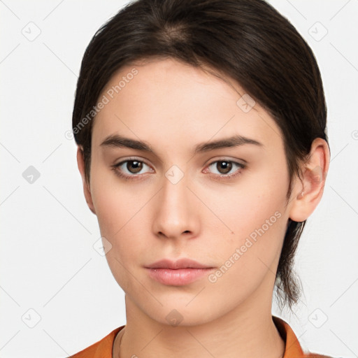 Neutral white young-adult female with medium  brown hair and brown eyes