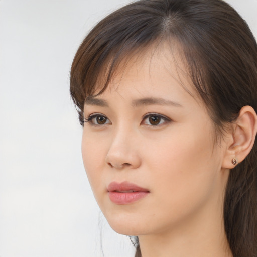 Neutral asian young-adult female with long  brown hair and brown eyes