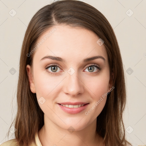 Joyful white young-adult female with medium  brown hair and green eyes