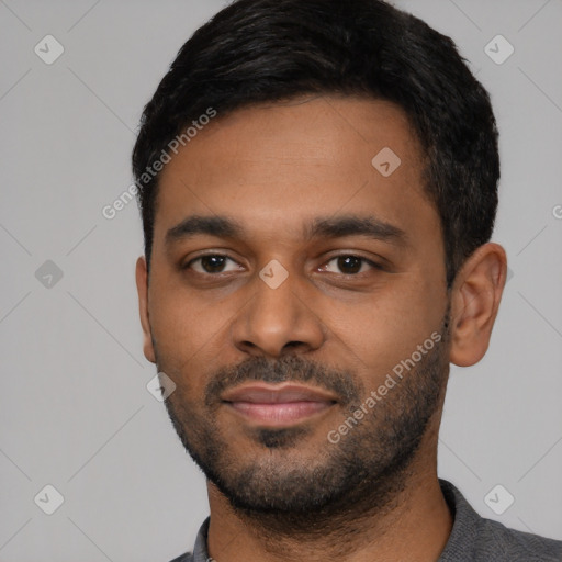 Neutral latino young-adult male with short  black hair and brown eyes