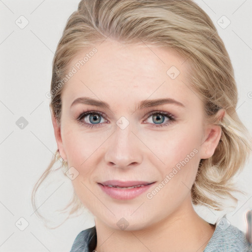 Joyful white young-adult female with medium  brown hair and blue eyes