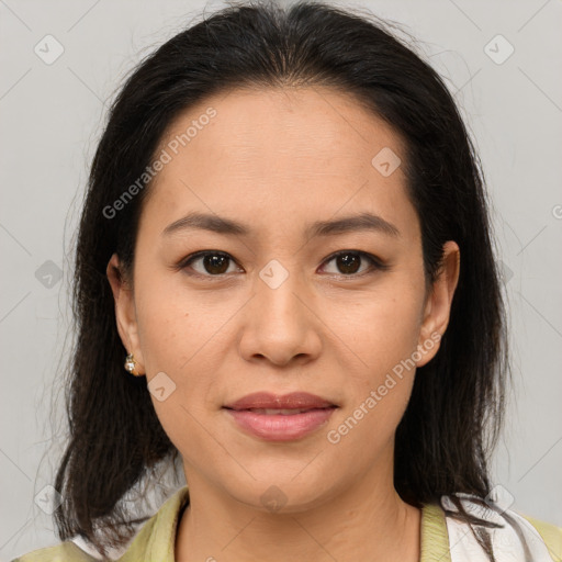 Joyful latino young-adult female with medium  brown hair and brown eyes