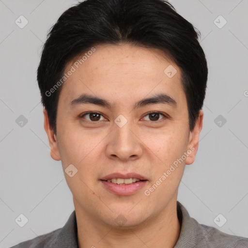 Joyful white young-adult male with short  black hair and brown eyes