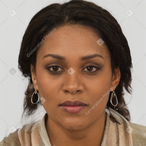 Joyful black young-adult female with long  brown hair and brown eyes