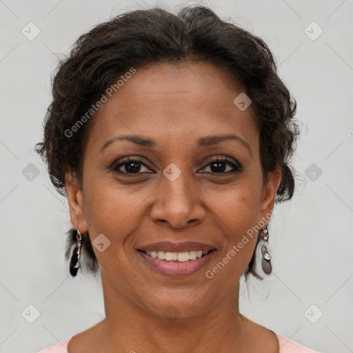 Joyful white adult female with short  brown hair and brown eyes