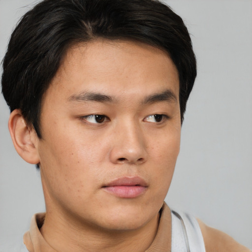 Neutral asian young-adult male with short  brown hair and brown eyes