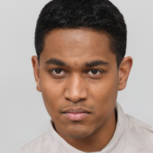 Neutral black young-adult male with short  black hair and brown eyes