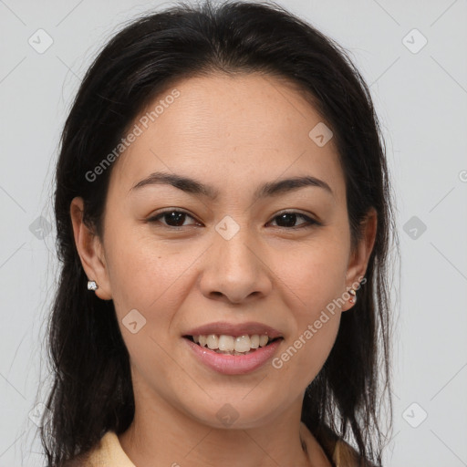 Joyful latino young-adult female with medium  brown hair and brown eyes