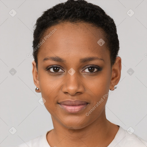 Joyful black young-adult female with short  black hair and brown eyes