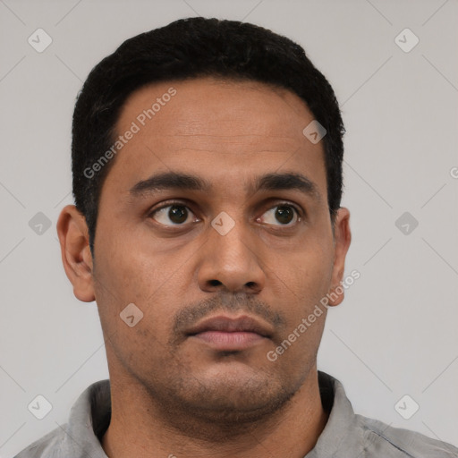 Neutral latino young-adult male with short  black hair and brown eyes