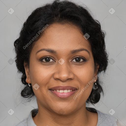 Joyful black young-adult female with medium  brown hair and brown eyes