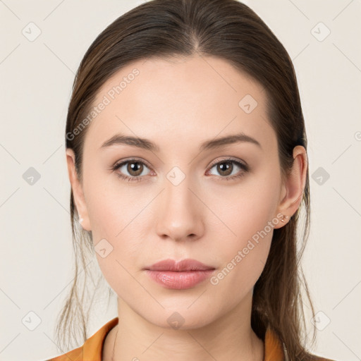 Neutral white young-adult female with long  brown hair and brown eyes