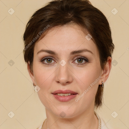 Joyful white adult female with short  brown hair and brown eyes