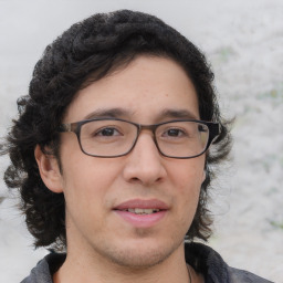 Joyful white young-adult male with medium  brown hair and brown eyes