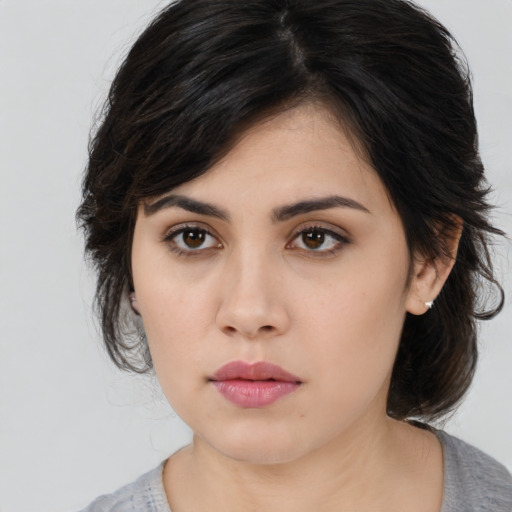 Neutral asian young-adult female with medium  black hair and brown eyes