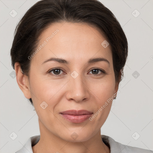 Joyful white adult female with medium  brown hair and brown eyes