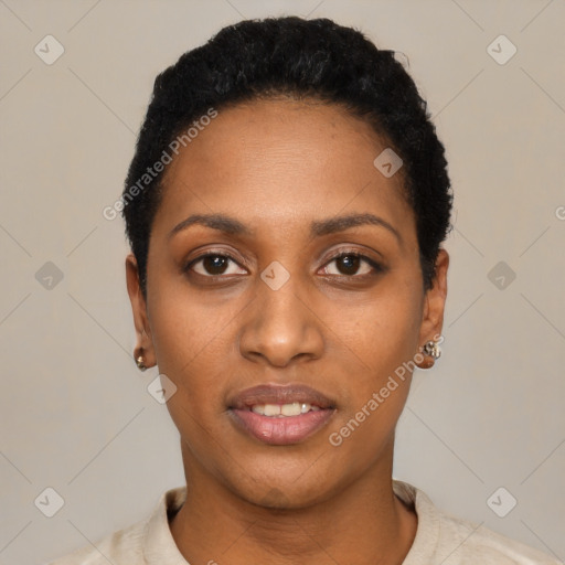Joyful black young-adult female with short  black hair and brown eyes