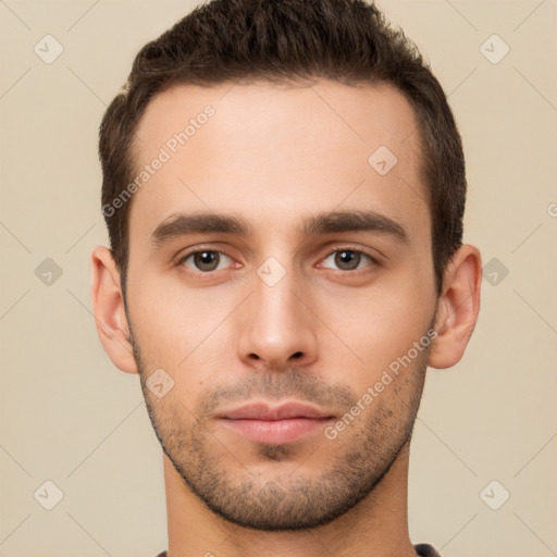 Neutral white young-adult male with short  brown hair and brown eyes