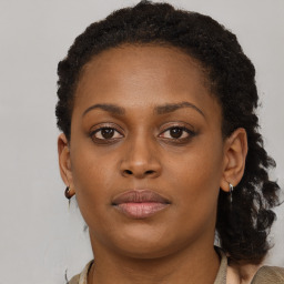 Neutral black young-adult female with short  brown hair and brown eyes