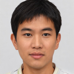 Neutral asian young-adult male with short  brown hair and brown eyes