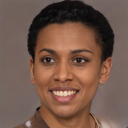 Joyful latino young-adult female with short  black hair and brown eyes