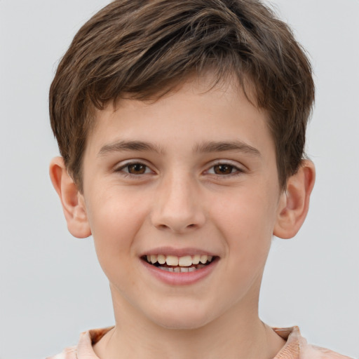 Joyful white child male with short  brown hair and brown eyes